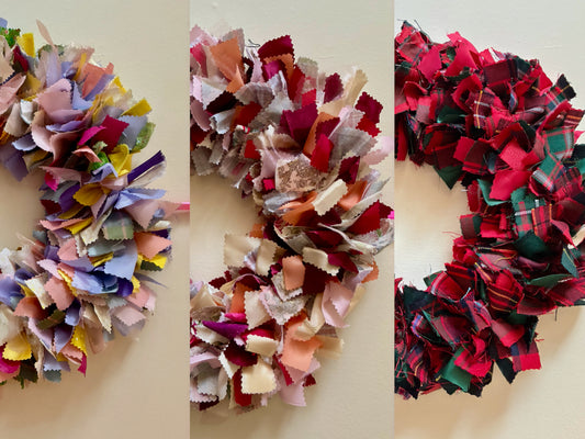 A selection of 3 circular fabric wreaths in different colour palettes