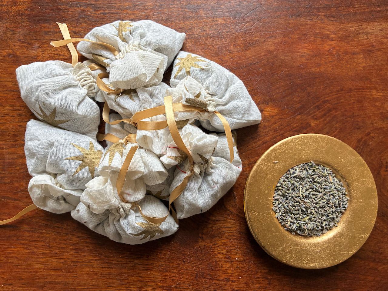 Cream and Gold Lavender Sachets and a saucer of Dried Lavender