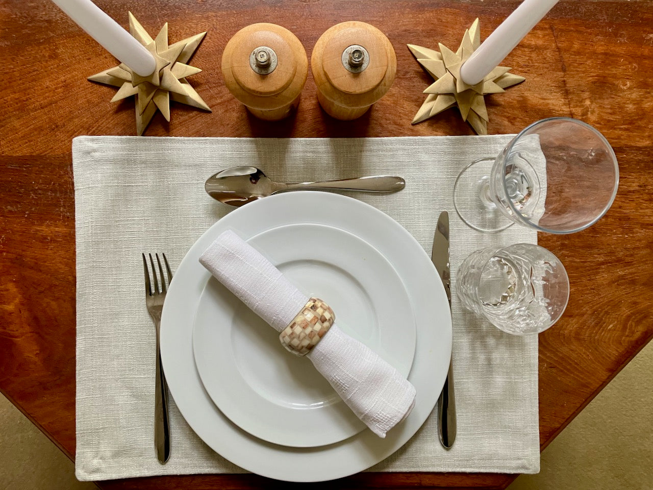 Dining table setting with lined Natural Linen Place Mat by Curlew Crafts, plates, cutlery and glasses 