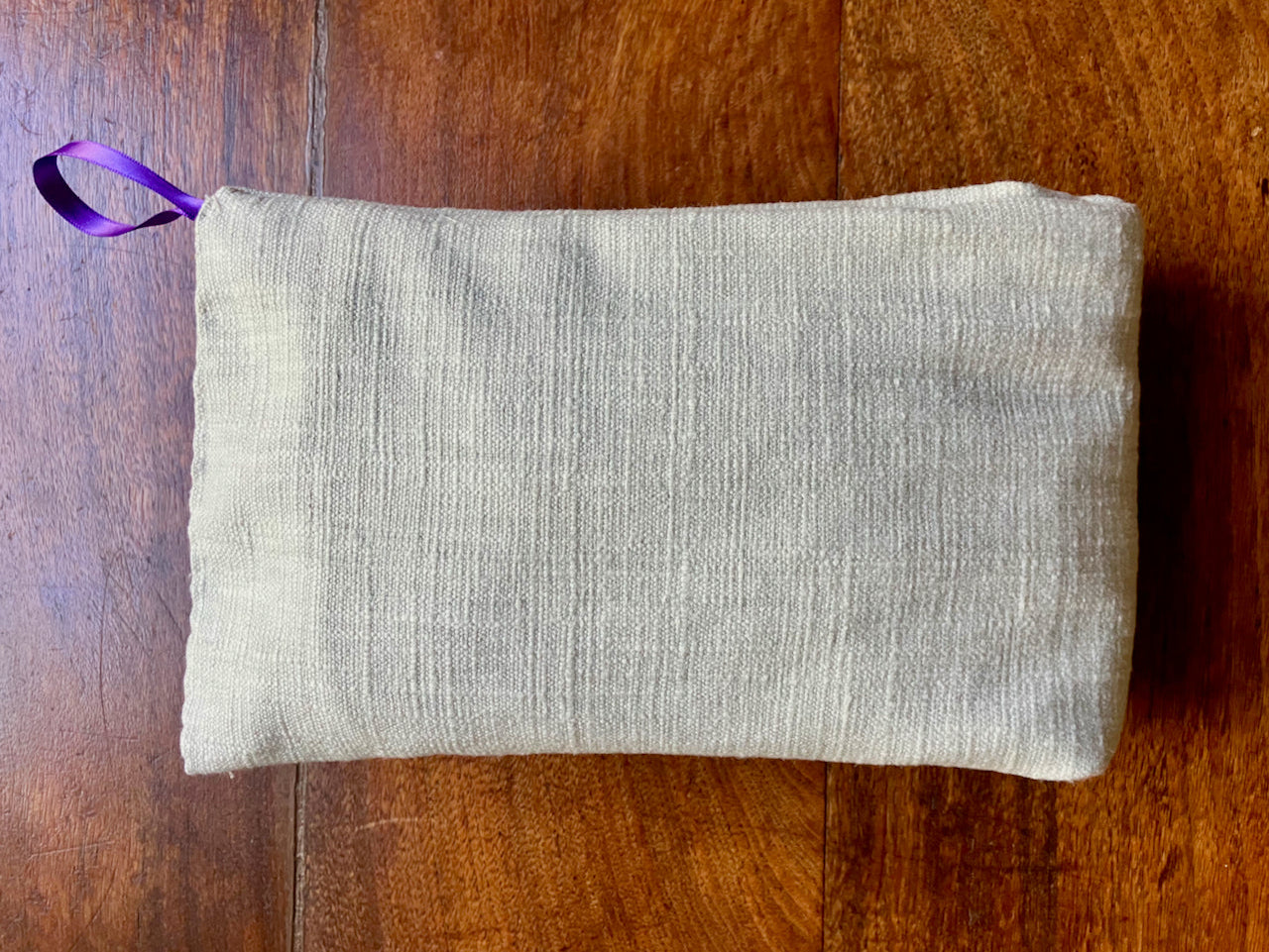 Folded Linen Lavender Wheat Bag with Purple Satin ribbon by Curlew Crafts