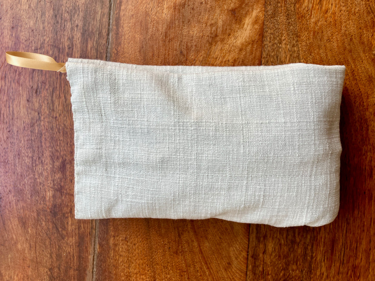 Folded Linen Wheat Bag with Gold Satin ribbon by Curlew Crafts