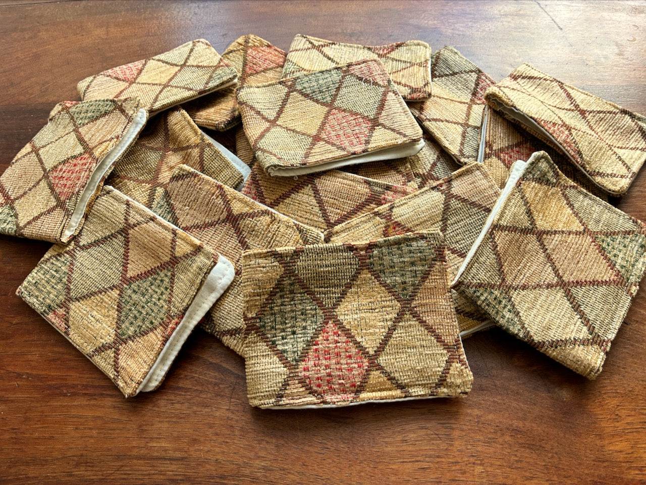 Pile of Harlequin Chenille Needle Cases by Curlew Crats