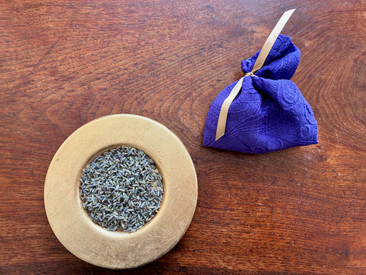 Single Purple Lavender Sachet with a saucer of Dried Lavender 