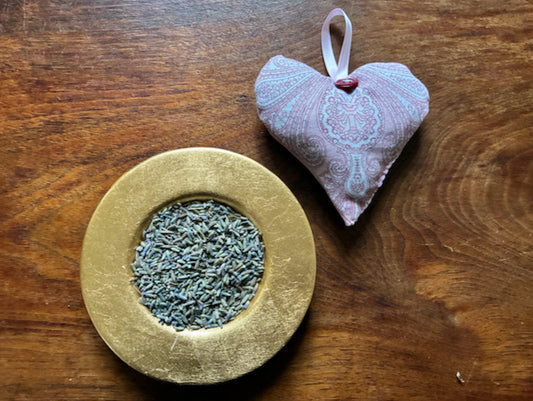Red amd White Paisley Lavender Sachet by a bowl of dried Lavender