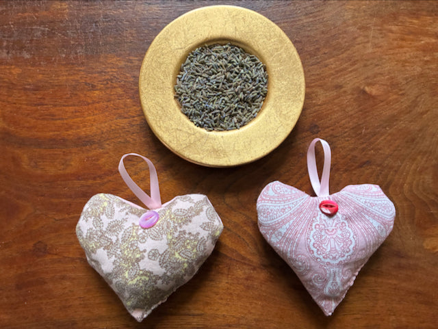 Set of Two Pink Paisley Lavender Sachets by a bowl of dried Lavender