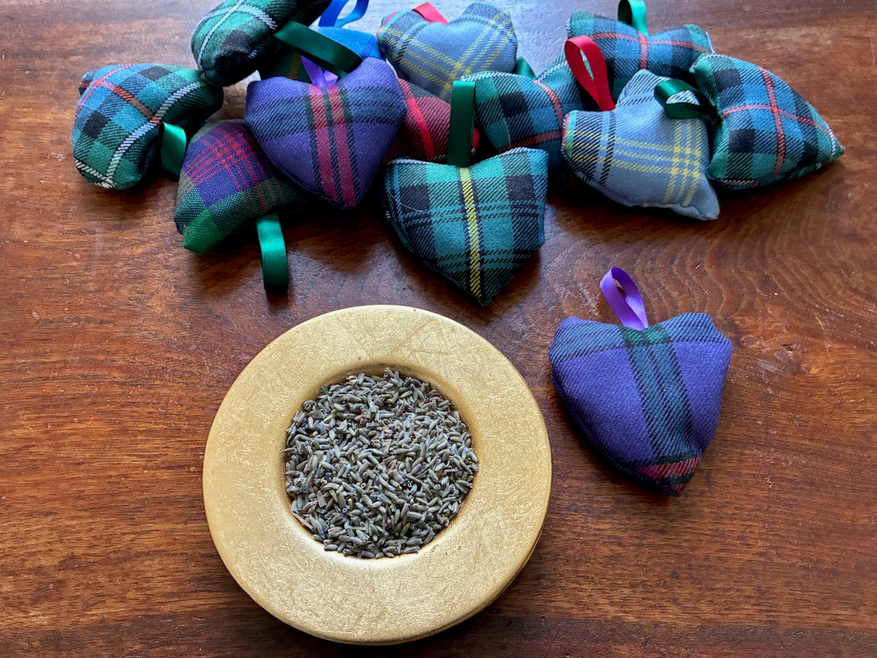 Small Tartan Heart Lavender Sachets with a saucer of Dried Lavender