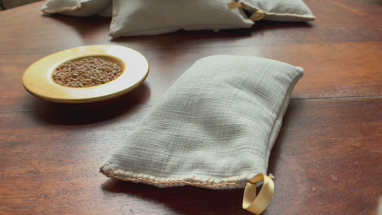 Small Linen Wheat Bag on a wooden surface